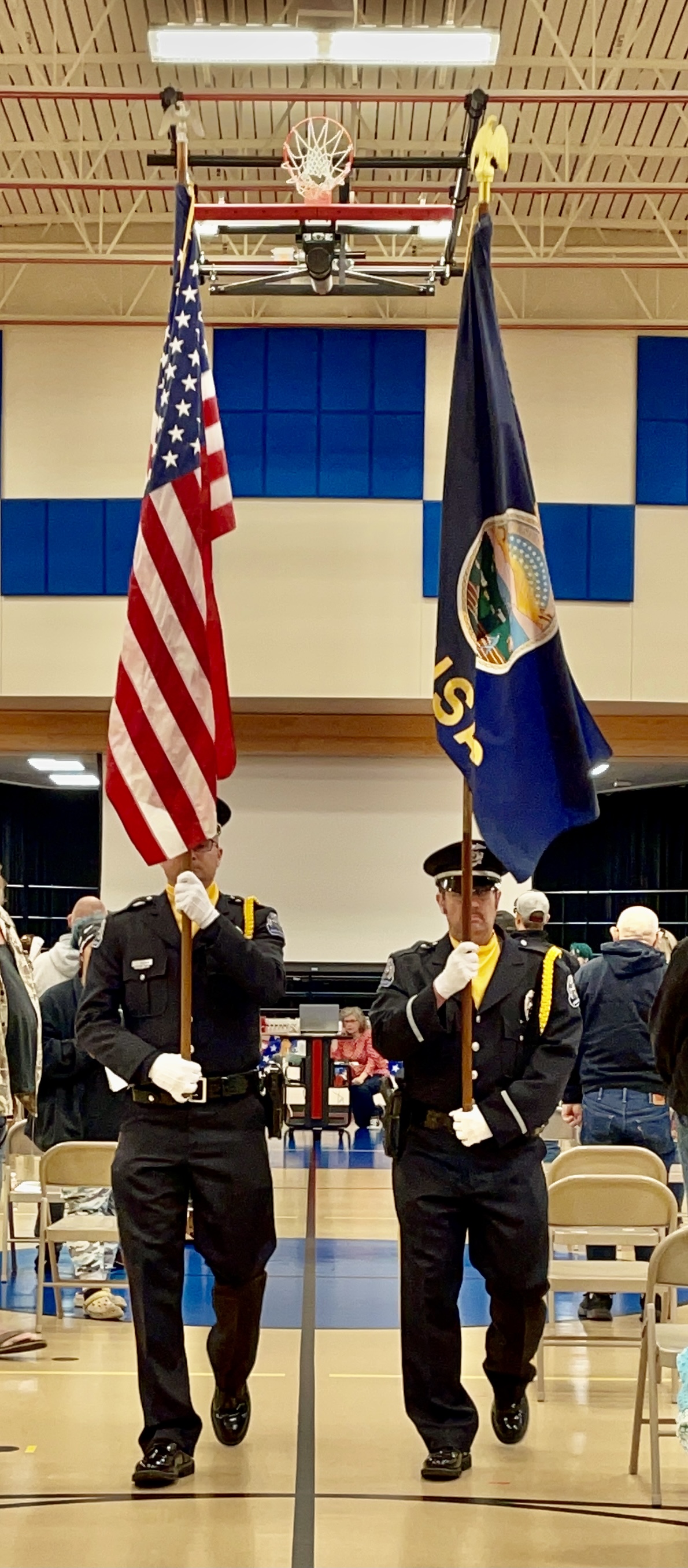 Officer Gresham and Sergeant Strobbe Presenting Colors for Veterans Day at Robinson Elementary